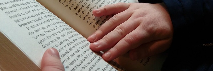 Reading-hands-holding-book-About-Reading-Inspiration-a-book-blog-for-kids-and-parents