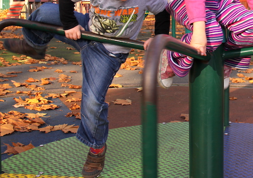 children climbing in playground - image for activity tracker kids article